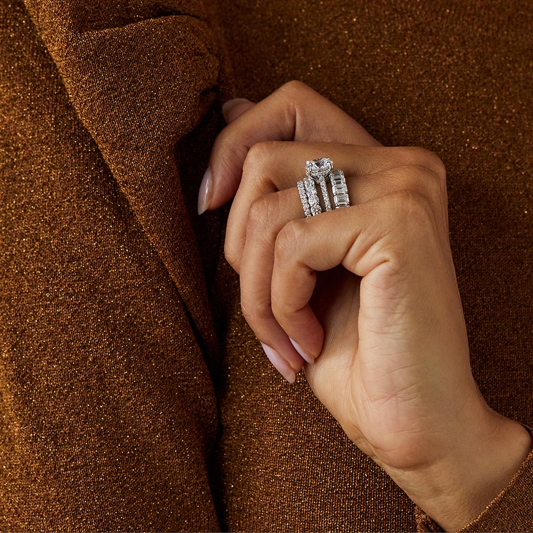 Jeandousset's tweet photo. Our most iconic ring, Chelsea, has everyone swooning. This ring is set with a 3.00+ carats round brilliant diamond and paired with our Angelina and Sophia bands. Shop and learn more at the link in our bio. #jeandousset #bespokejeweler #eternitybands #roundengagementring https://t.co/02eAQQSLOW