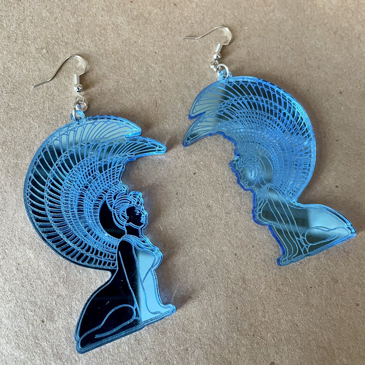 shopitemget's tweet photo. Someone had requested the Southern Oracle as earrings. I think they came out pretty rad. #neverendingstory #southernoracle https://t.co/EBXvMoyI3k