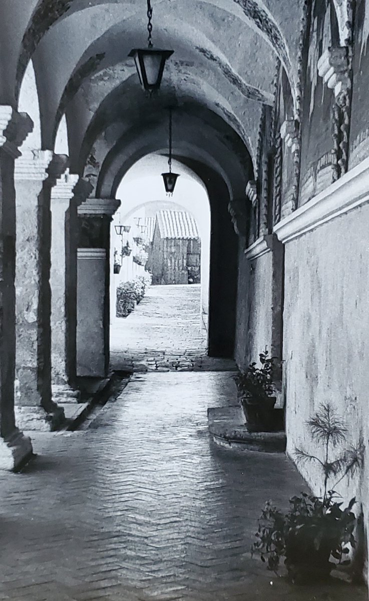 GranmaJeanMayer's tweet image. This PERUVIAN PALAZZO ARCHWAY was taken in 1985 and from this angle, it made me feel as though I were walking through a portal into another era.