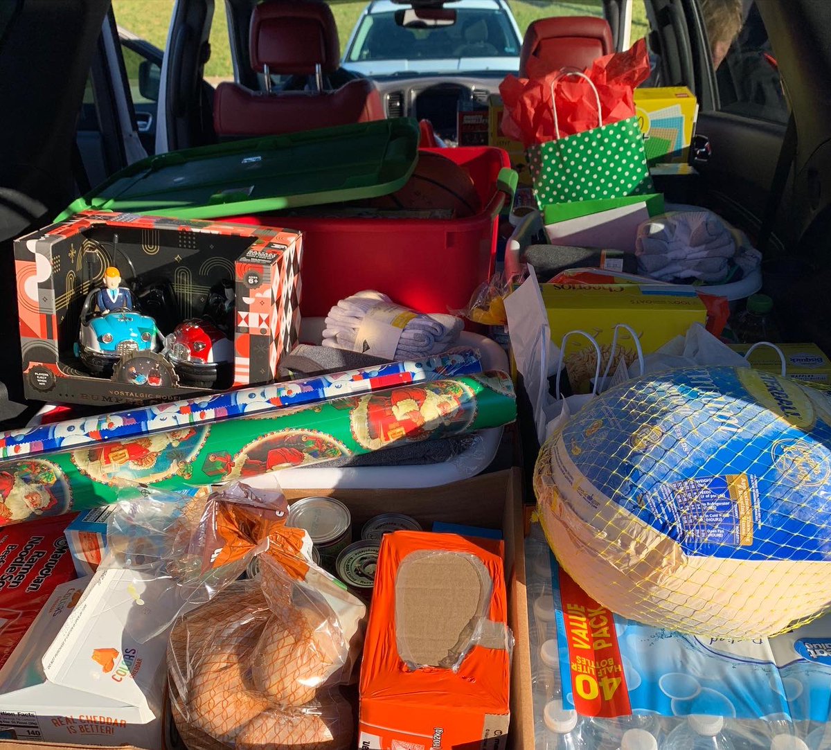 CentralGreeneSD's tweet photo. Waynesburg Central High School’s boys’ varsity basketball team, along with their parents and booster organization, recently blessed a family in need.  They were able to provide clothes, toys, gift cards, food for a Christmas dinner as well as pantry staples.  #OurRedAndBlack https://t.co/KnTXpjBdRE