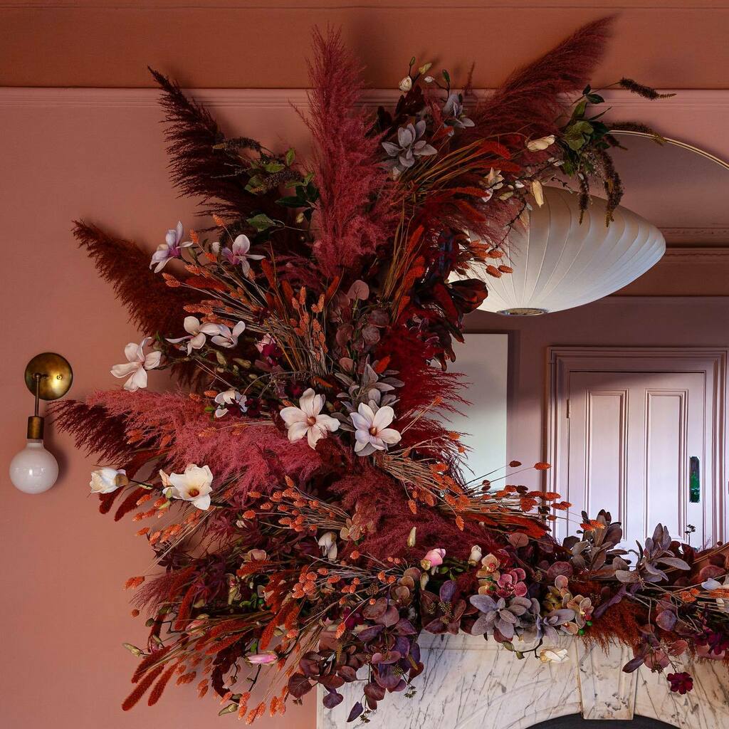 Pampas grass forever! I just realised I hadn't shown you a close-up of this year's mantel. To answer some of your questions; no I haven't used a filter on this, these are the real colours! It's held up with 2 pieces of wire strung up to drawing pins in t… instagr.am/p/CXy1156r-m5/