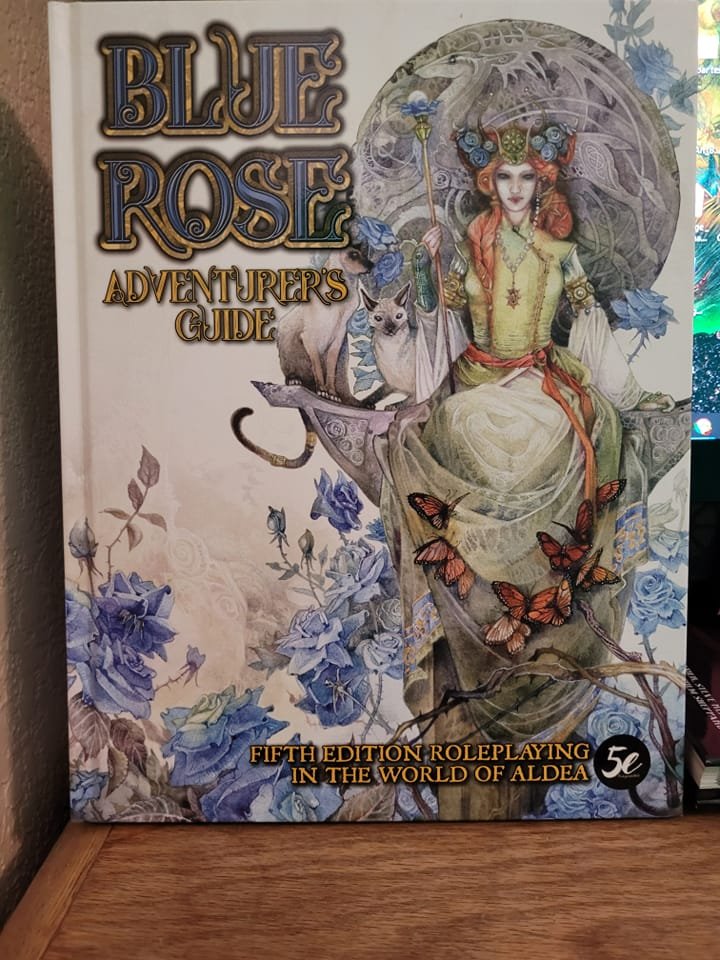 GM_Jonesy's tweet photo. My Kickstarter copy of #BlueRoseRPG by @GreenRoninPub arrived today! #ttrpg #5e #rpg #dungeonsanddragons #Gaymer https://t.co/wtPmz0aZIU