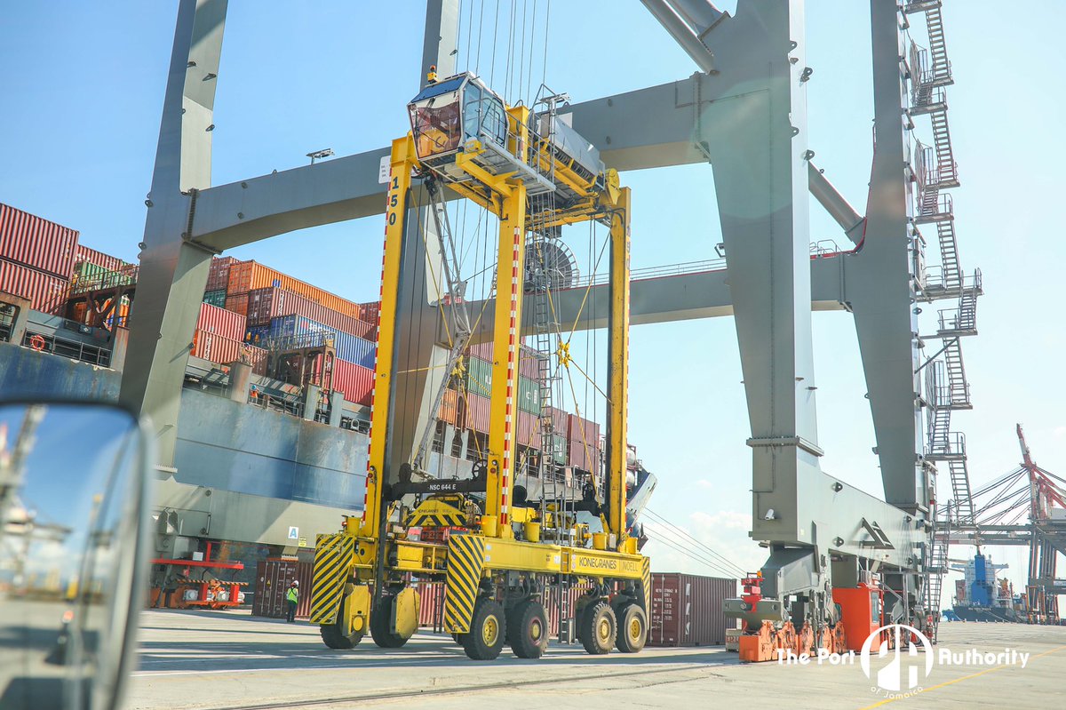 PortAuthorityJa's tweet photo. A Straddle Carrier makes its way under the Gantry Crane to pick up a container to take to the terminal yard.

These very large freight carrying vehicles are essential to the logistics supply chain at the #PortofKingston.

#GlobalLogisticsServices #KFTL #PortAuthorityJa https://t.co/BLM2FMPW8w