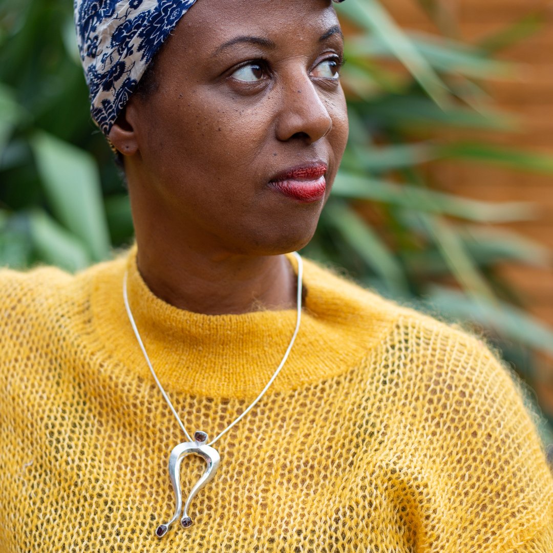 DavidJohnLilly's tweet photo. So sunshine yellow and deep red, two wonderfully warming colours for winter.

This Garnet Eir pendant that Ange is modelling is attuned to Isis.  How appropriate to be modelled by this amazing woman.  

According to https://t.co/0uBKMCcVTO, Isis is a goddess in Egyptian mytholog https://t.co/ZcvhtNOiHh