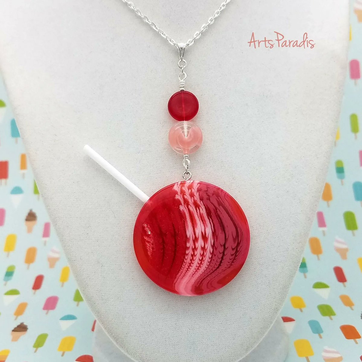 ArtsParadis's tweet photo. I love to do quirky designs. Perfect for teachers, confectioners, and anyone that's sweet! ;)  https://t.co/kjpLspjoVZ #handmadejewelry #womanowned #LGBTQowned #proudartist #lollipop #sweetsforthesweet #confectioners #candymaker https://t.co/2IC4sETNrd