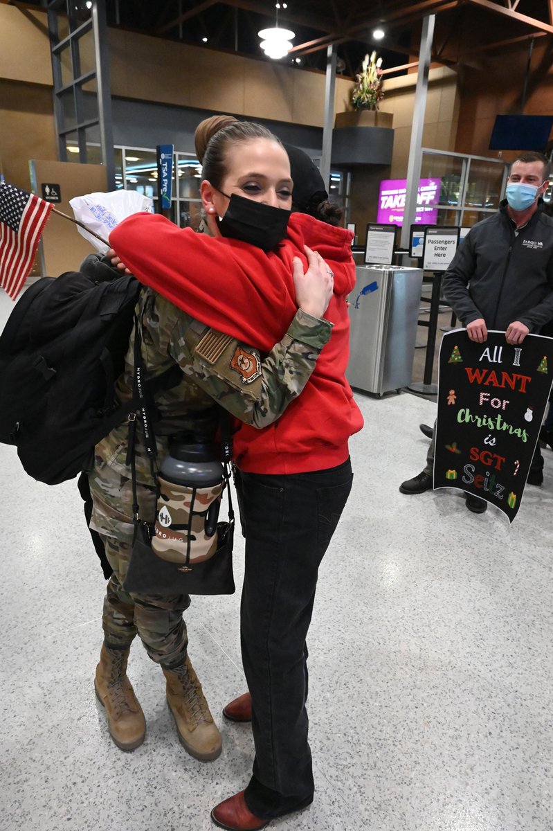 NDNationalGuard's tweet photo. It was a joyous homecoming reunion for these two #HappyHooligans at Hector International Airport. They are returning to Fargo after completing a six-month deployment to southwest Asia. Welcome home to puppy kisses and a mother's hugs! https://t.co/WDxdPv3MXn