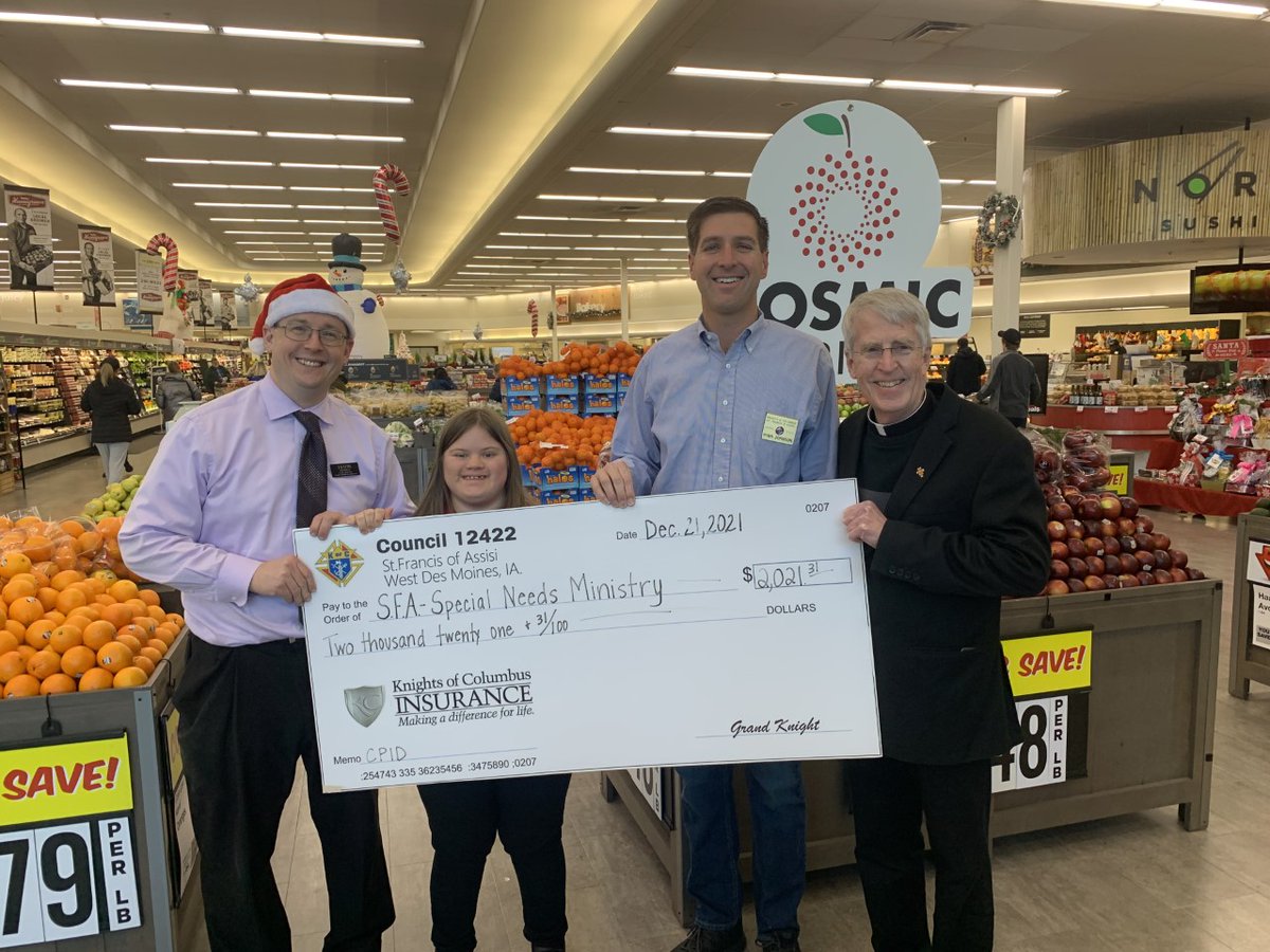 sfawdm's tweet photo. Grand Knight Ryan Johnson presented a check on behalf of Council 12422 to Fr. Ray McHenry from St. Francis of Assisi Catholic Church. The donation of $2,021.31 is a portion of the annual CPID fundraiser and will go toward the Special Needs Ministry. https://t.co/RRZllJsIC0