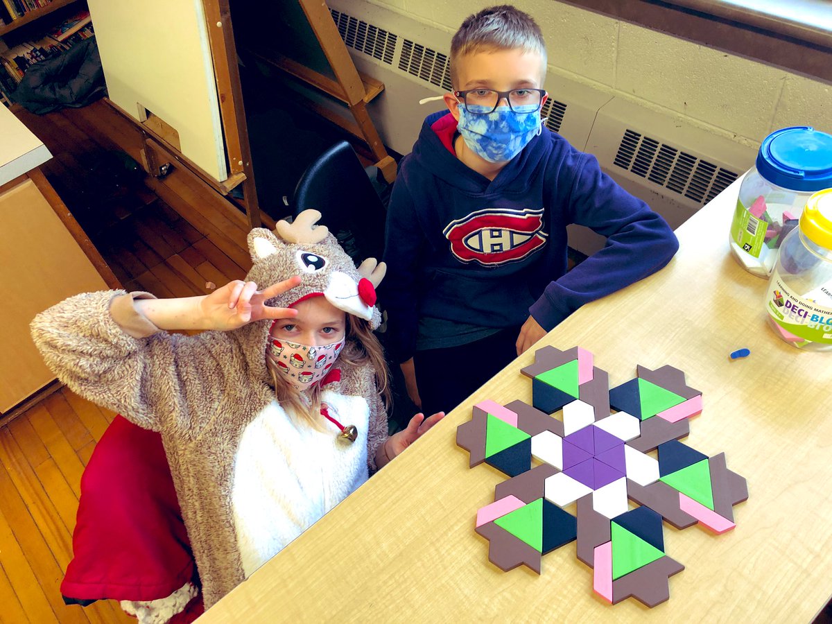 MrKSDyck's tweet photo. On their second day of creating rotationally symmetrical designs with #DeciBlocks and #PatternBlocks, Grade 6/7s @PortWellerPS were asked to create designs with #RotationalSymmetry of order 6 but with NO #LineSymmetry. #Math #Geometry #SpatialSense https://t.co/2ZzV5c4Zft