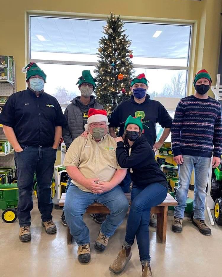 Merry Christmas from our Green Tractors Kingston Parts Elves! 🎅🏼

Back left 
Jason Mckane, James Kilgore, Clinton Cronk, Jason Baker
Santa (Darrell) and of course the Queen of Elves, Krista Campbell 🎄