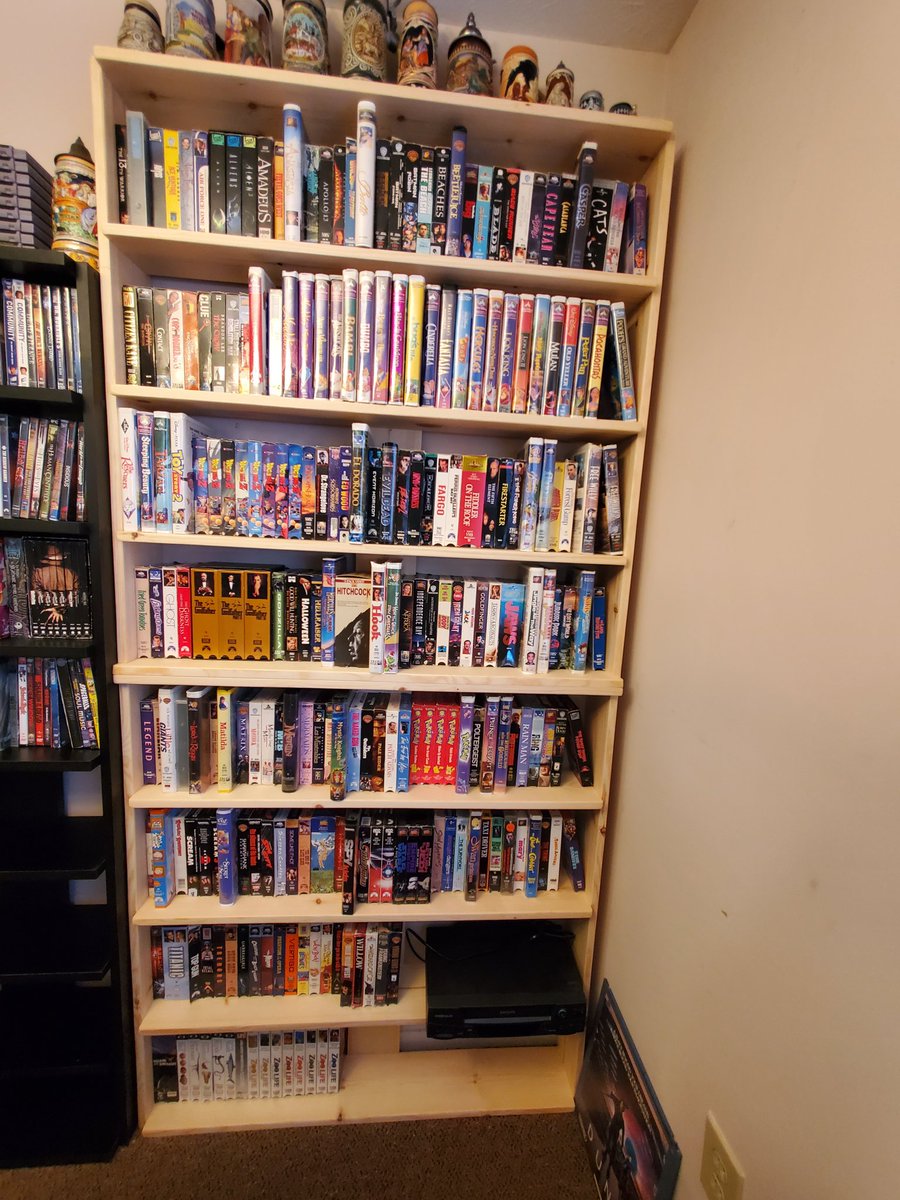 TheDeadMetaphor's tweet photo. Finally finished building/setting up the new VHS shelf. It's starting to look like a Blockbuster in here.
#retro https://t.co/9blrdmZEum