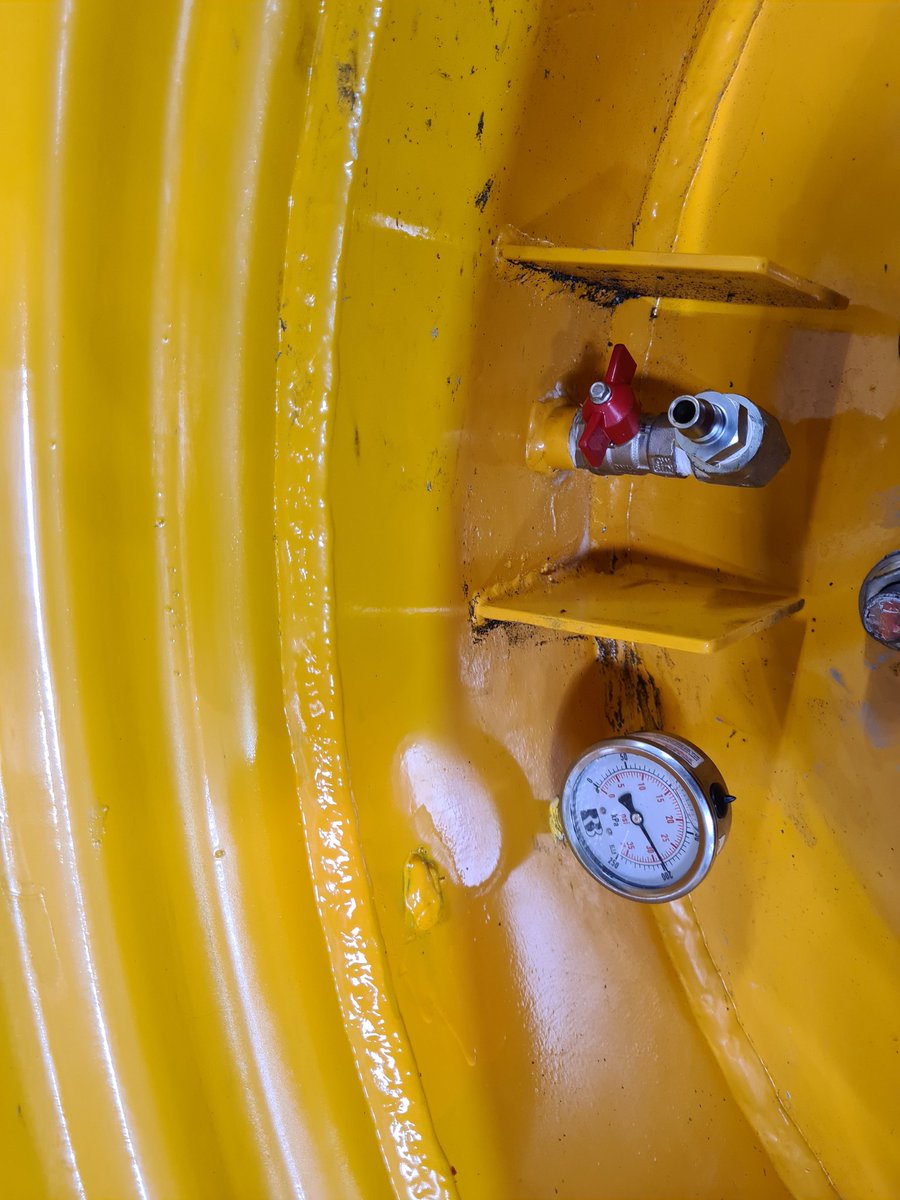 Putting a 3/4" taps and nitto couplers and a 35psi gauges permanently mounted in the rims of our tractors.
