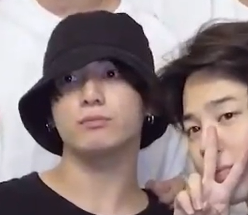 jeonficient's tweet photo. look at jungkook's big eyes peaking underneath his bucket hat :( https://t.co/qt5qMqkQgs