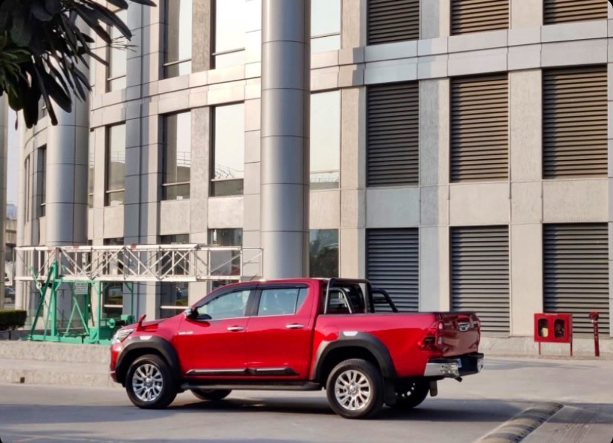 SirishChandran's tweet photo. Looks like the #Hilux will finally arrive in India

Got this in my DMs, while being shot for TVC (also, why is it being shot in Cyber City and not in the mountains / desert / jungle with an ADV strapped into the load bay?)

Excited? And what do you think it should be priced at? https://t.co/NW7NJvCUbV