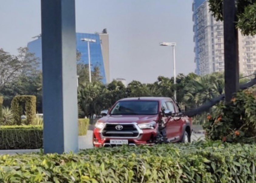 SirishChandran's tweet photo. Looks like the #Hilux will finally arrive in India

Got this in my DMs, while being shot for TVC (also, why is it being shot in Cyber City and not in the mountains / desert / jungle with an ADV strapped into the load bay?)

Excited? And what do you think it should be priced at? https://t.co/NW7NJvCUbV