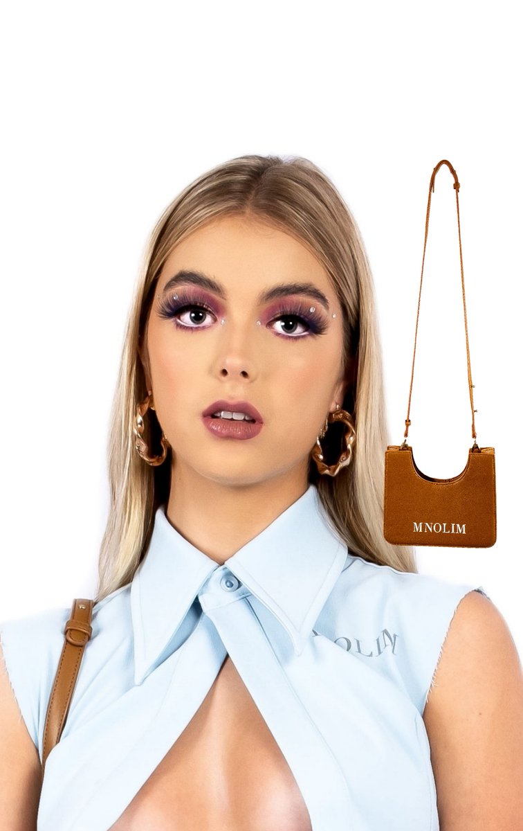 mattenolim's tweet photo. Matte Nolim 
Makhwapheni Bag Color 2 
The cut out designs function is for bag security and comfort, so bag can fit like a puzzle underneath wearers arm, strap is now removable or can be tucked into bag for bag purse mode. https://t.co/arfalWzKhb