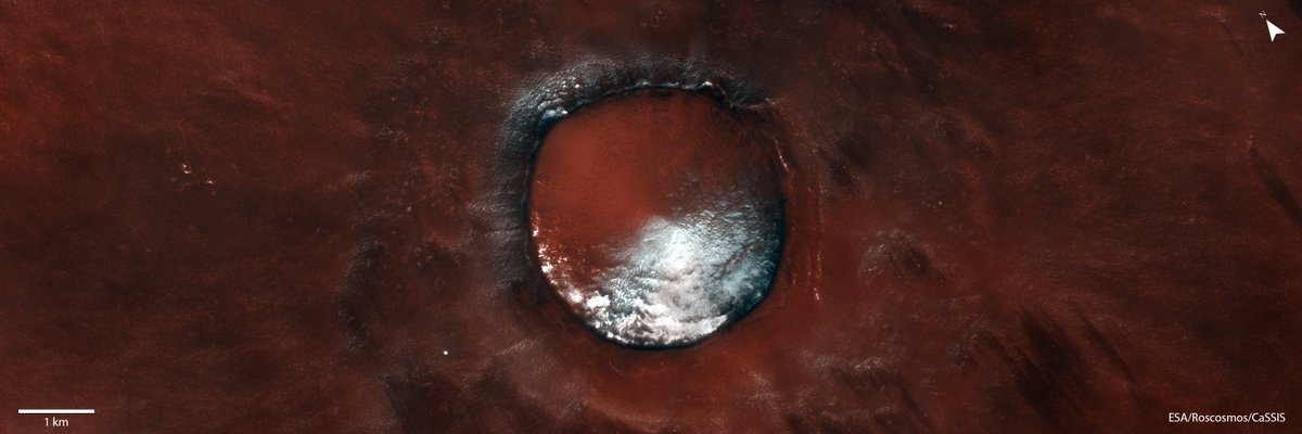 Ice-filled crater in the Martian polar region of Vastitas Borealis. Water ice may exist for longer periods on north facing slopes, which receive fewer hours of sunlight on average throughout the year. 
#ESA #UniBern #Mars #ExoMars #Roscosmos