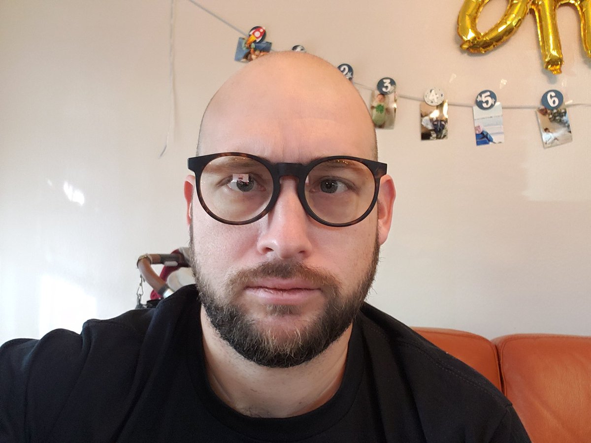 TheStroBro's tweet photo. Trying this out. Since my face is in a screen all day I asked for @goodr #bluelightglasses #notironic #notahipster https://t.co/H1R1wgITYQ