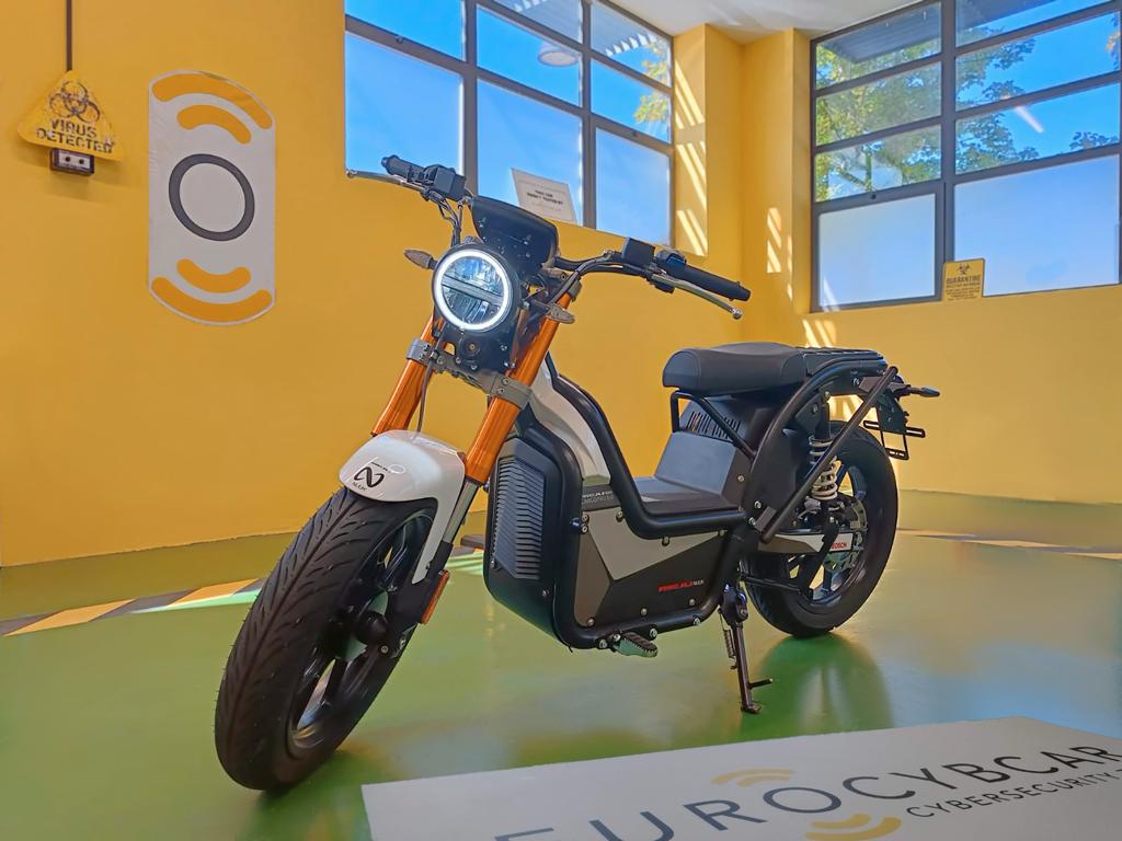 AENOR's tweet photo. 🛵🔒La moto eléctrica NUUK Cargopro P, primer vehículo del mundo que supera el test @eurocybcar que  respalda su condición de ciberseguro. @AENOR auditará su ciberseguridad #Ciberseguridad #MotoEléctrica #NUUKMobility #AENORConfía https://t.co/2bKaynepFx https://t.co/9iaiK267qh