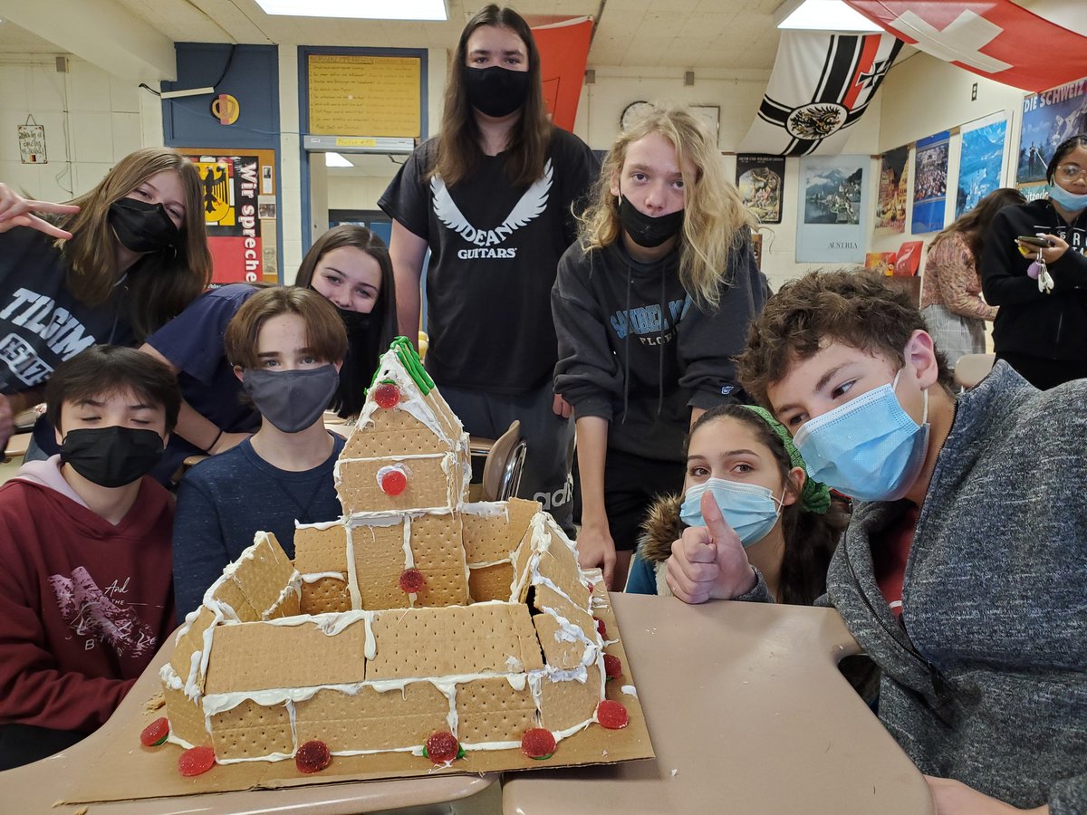 HerrOehlers's tweet photo. German-style Gingerbread &amp; Graham Cracker Houses for a fun way to bond as we head into the holiday break! Fröhliche Weihnachten! #collsedu https://t.co/L4ftKX7Sb6