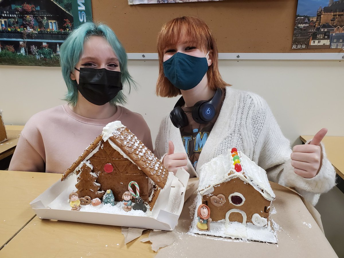 HerrOehlers's tweet photo. German-style Gingerbread &amp; Graham Cracker Houses for a fun way to bond as we head into the holiday break! Fröhliche Weihnachten! #collsedu https://t.co/L4ftKX7Sb6