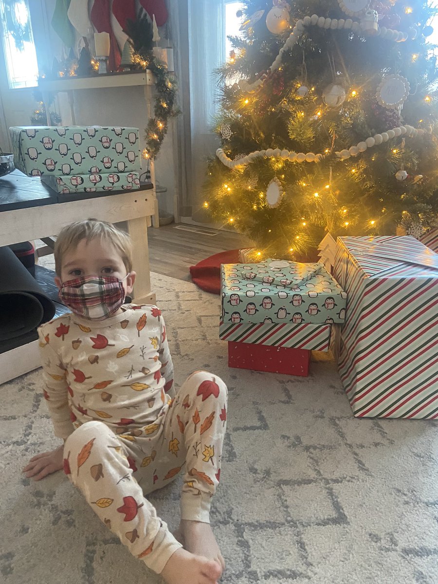 klcbach's tweet photo. Covid Christmas 🙃 masked up and keeping gift opening to under 15 minutes. I love this for us! https://t.co/CZ3GBKbmT5