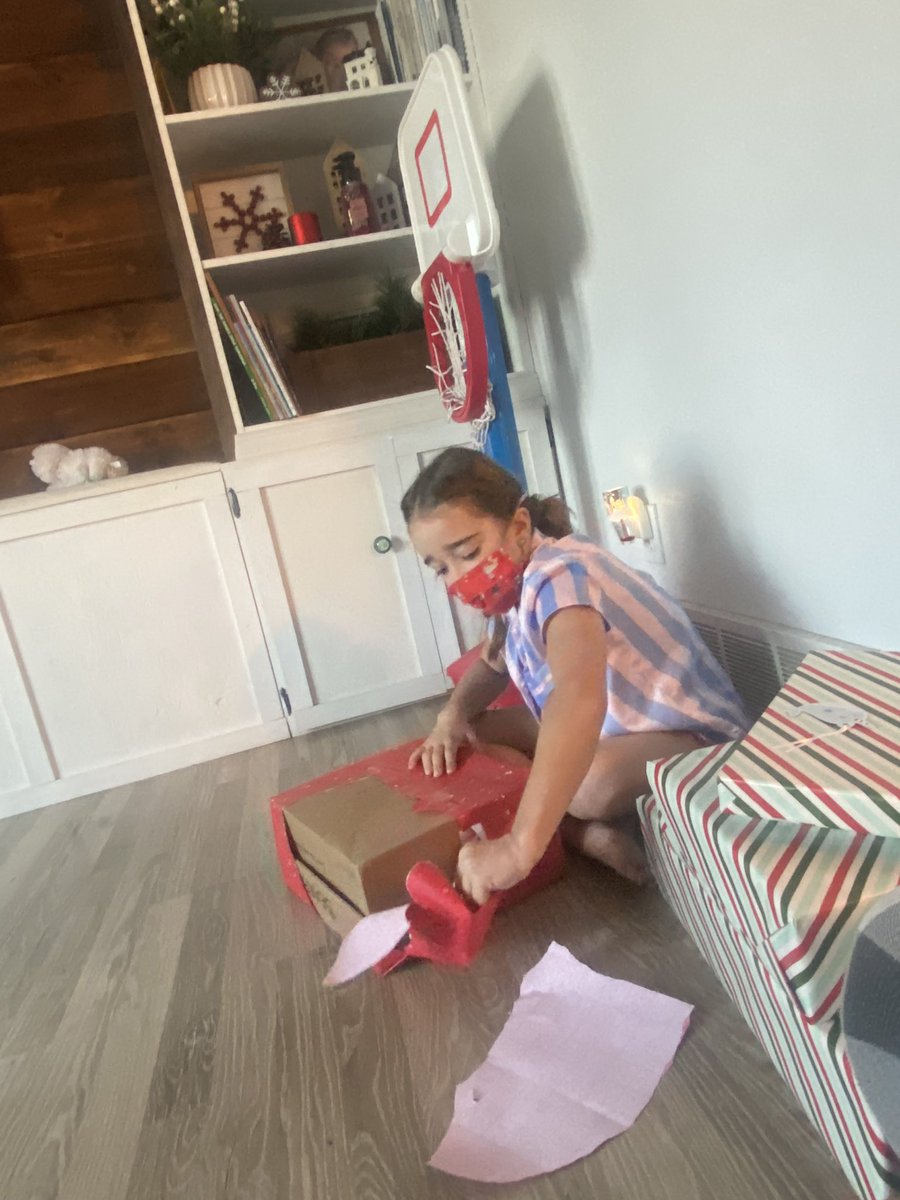 klcbach's tweet photo. Covid Christmas 🙃 masked up and keeping gift opening to under 15 minutes. I love this for us! https://t.co/CZ3GBKbmT5