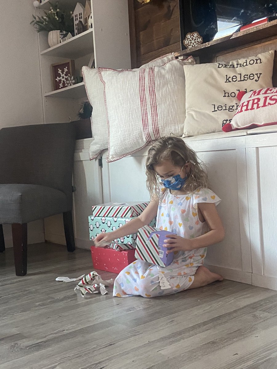 klcbach's tweet photo. Covid Christmas 🙃 masked up and keeping gift opening to under 15 minutes. I love this for us! https://t.co/CZ3GBKbmT5