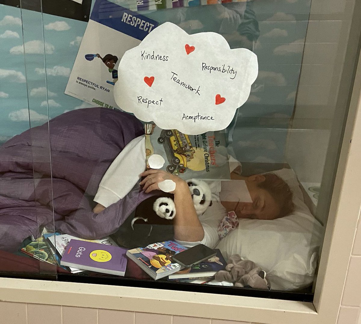 PrincipalGarden's tweet photo. When it’s the last day before break…napping in a display case makes sense! #mayorocks @MayoElem @ChooseToBeNice #tiredprincipal #momsasprincipals #bestsurprise https://t.co/3aH5fWUDxq