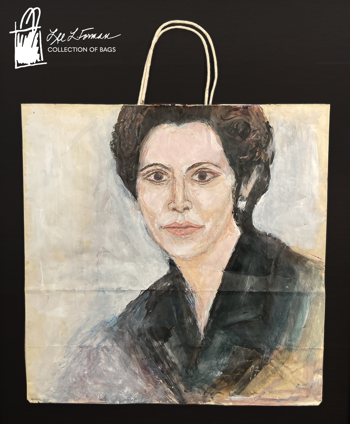 2/365: The Lee L. Forman Collection of Bags began with the paper Bloomingdale's bags. Forman began collecting in 1971 while she was a student at American University. Today the collection contains 12,000 bags & bag-related ephemera from a variety of merchants and designers. This paper bag is painted with a portrait of Lee L. Forman. Forman was a graphic designer who viewed bags as works of art deserving of the same admiration as any artwork. In 2002, she and husband Howard Forman founded the Museum of Bags to house the growing collection. In the years following her death in 2009, the Forman family continued to expand the bag collection, donating it in Lee's name to the Institute for Human Science and Culture at The University of Akron in 2019. It is today used for research, teaching, education, and exhibition. 