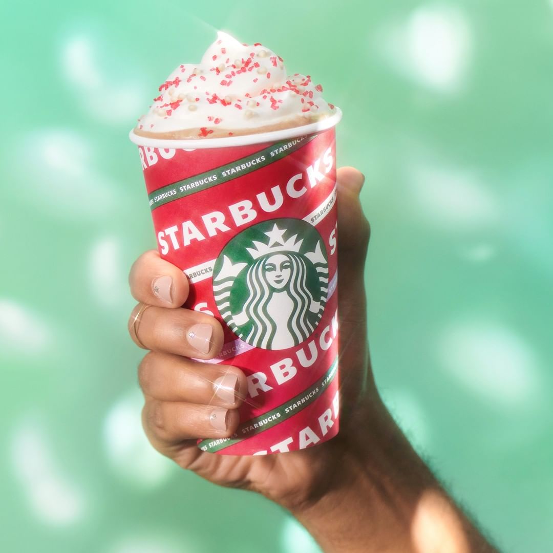 Is it really the holidays if you didn’t take a photo with your red <a href="/starbucks/">Starbucks</a> cup?