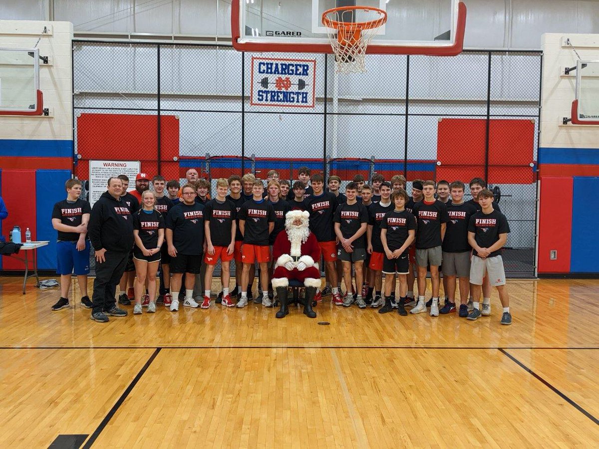 NDcharger_fball's tweet photo. Had a visitor pop in this morning during his busy time to give the player a little early Christmas present. 
#finisheverything
@CoachStirn 
@NDChargers https://t.co/1A68Ibyt4U