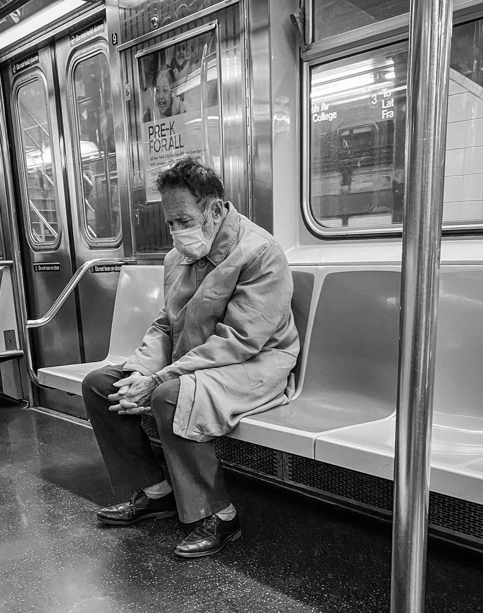 Mctweeter_son's tweet photo. This is a photo I took during the height of the pandemic in NYC. I was riding the subway into The Bronx for work. We were the only 2 in the subway car. Silent. Silent, yet speaking to me loudly without a single word. #NYC #pandemic #picoftheday #fyp #photographer #photog #subway https://t.co/HZ5bAAjjE5