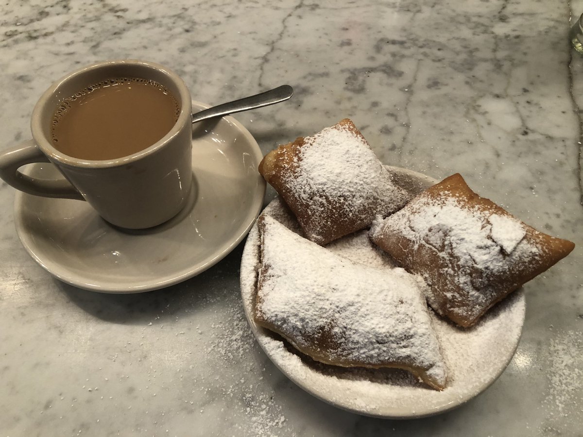 KG5GJT's tweet photo. Café au lait and Beignets tonight. Great view of the City of the Dead from the coffee shop. #EL49 is not short on beautiful views. #CityOfTheDead #LifeBelowSeaLevel https://t.co/ErgNh03AoG