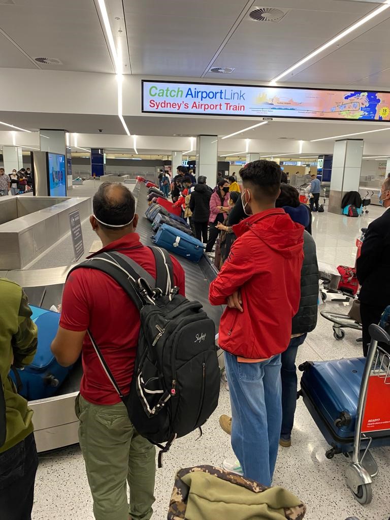 AustradeIndia's tweet photo. Great Buzz at @SydneyAirport with the arrival of #internationalstudents. Our @mksouthasia met 2 #Indian students have been studying online and dreaming about arrival into 🇦🇺 for 2 years. With their dreams meeting reality, they are excited for their first Christmas in #Australia. https://t.co/eV9rd1VRhf