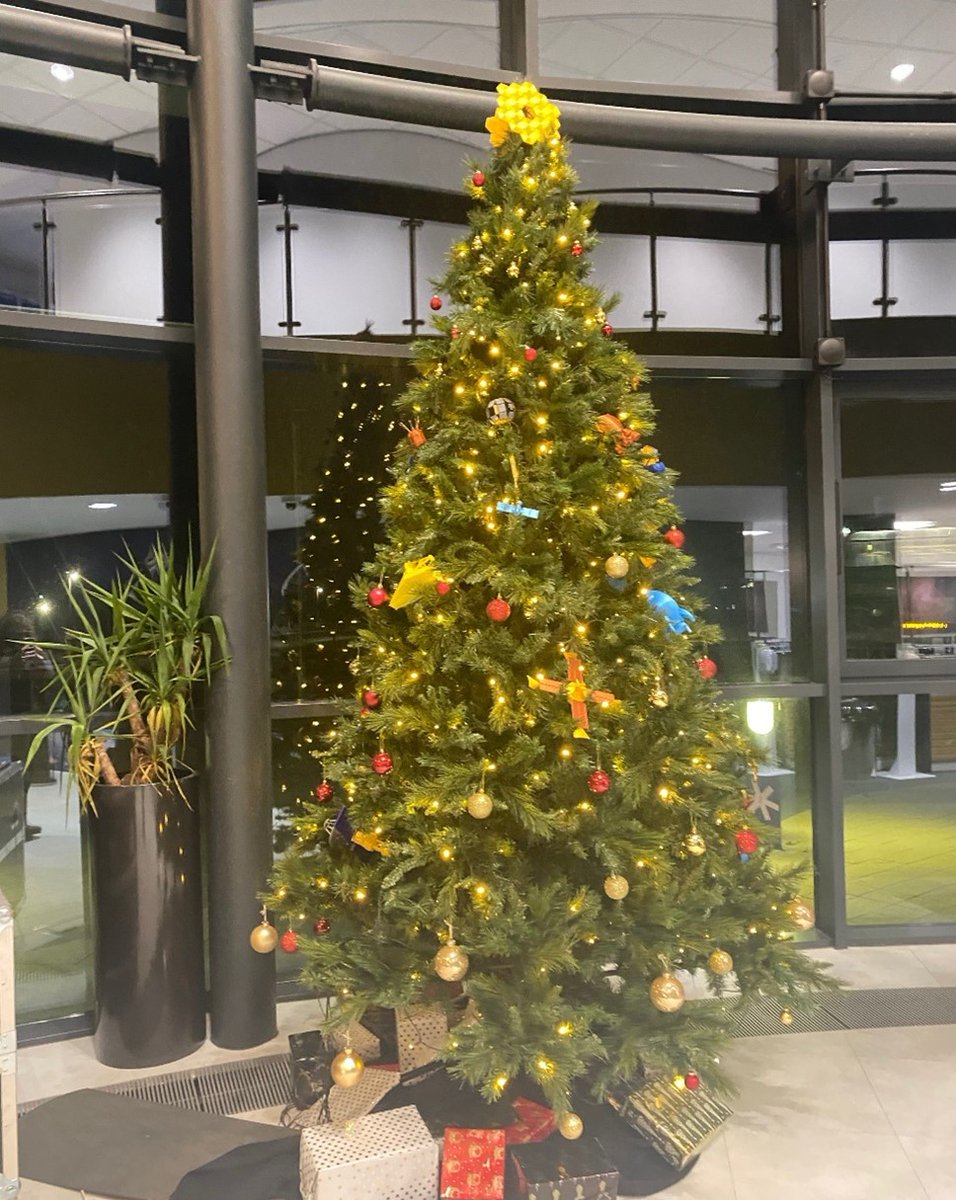 The RAL Space Christmas Tree with a topper in the shape of the Webb telescope's mirrors