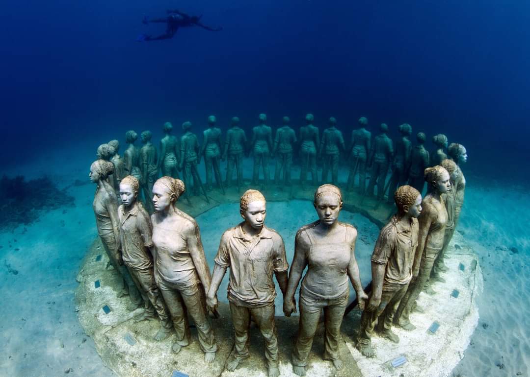 These underwater sculptures are located in the Caribbean Sea along the coast of Grenada. It honors Africans who were thrown and who jumped overboard from slave ships during the Middle Passage of the Transatlantic slave trade.