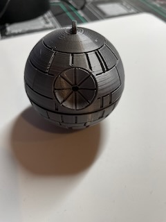 XTbe's tweet photo. Need to wire some #led but nice addition already to the #xmas tree. #deathstar ball printed on @Prusa3D #mini with the shiny @extrudr #biofusion metallic grey. This printed at 60% https://t.co/bqKkn8aB0x