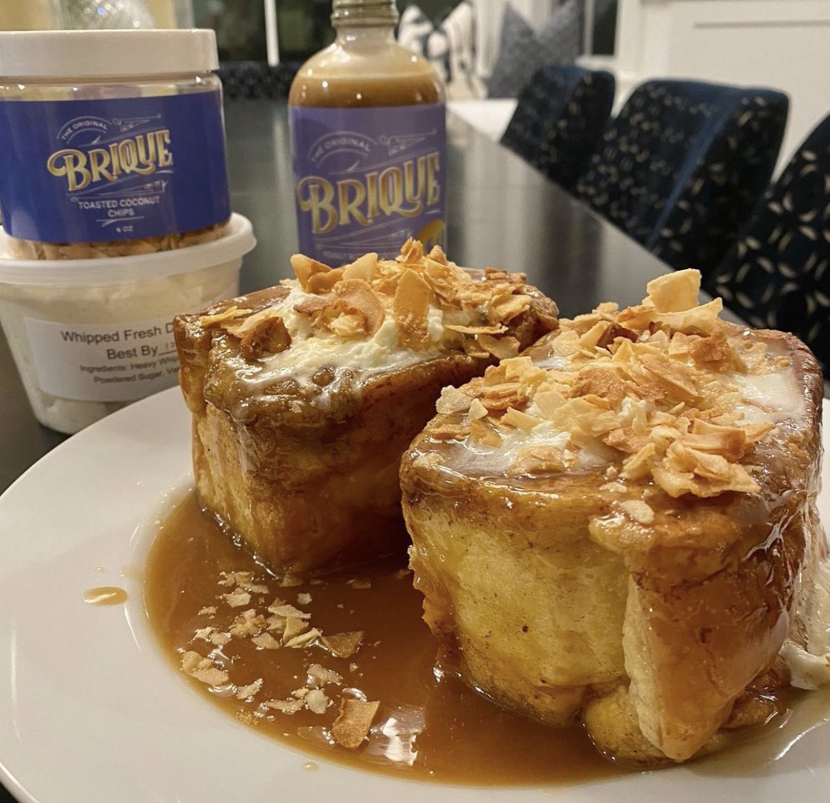 darrenrovell's tweet photo. The famous French toast cheat meal enjoyed by @TheRock from his chef, Chef Rocky, is now available to the masses at Brique at the Westfield Century City Mall in LA.

Four inch thick brioche has peanut butter coconut syrup, vanilla bean whipped cream &amp; toasted coconut chips ($26) https://t.co/DBOzZTeDdV