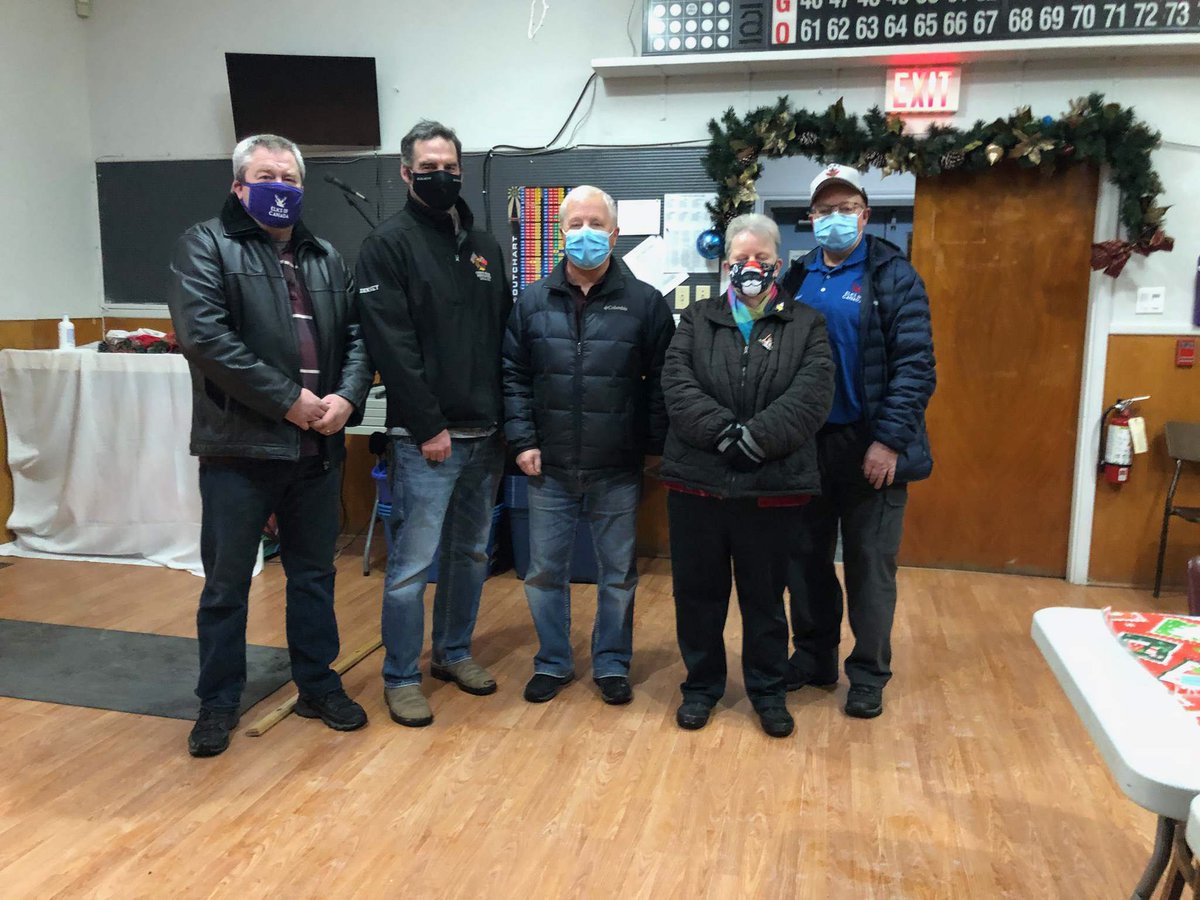 COVID &amp; a Turkey shortage played havoc with our Ham &amp; Turkey bingo plans, but we still supported the Toy Drive and the Food Bank with a donation of $1,000 each.
Pictured (l-r): ER Alfred Ford, Greg Dinney (firefighter), Larry Palmer (Food Bank), Linda French, Bro Boyd Fisher
