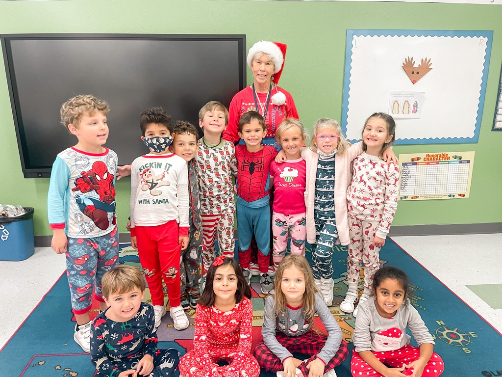 Merry Christmas Eve - we hope you are all cozy by the fire like Mrs. Merrill's class. This photo was taken from their Pajama and Polar Express day!