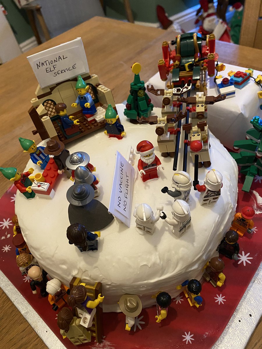fionaell's tweet photo. Christmas 2021.  Santa is grounded because he didn’t get his second vaccine.   The Elves are running booster clinics. And the stormtroopers think Rudolf looks suspiciously infected and give him a PCR Test.  Merry Christmas everyone. https://t.co/c1o1k6kJ7c
