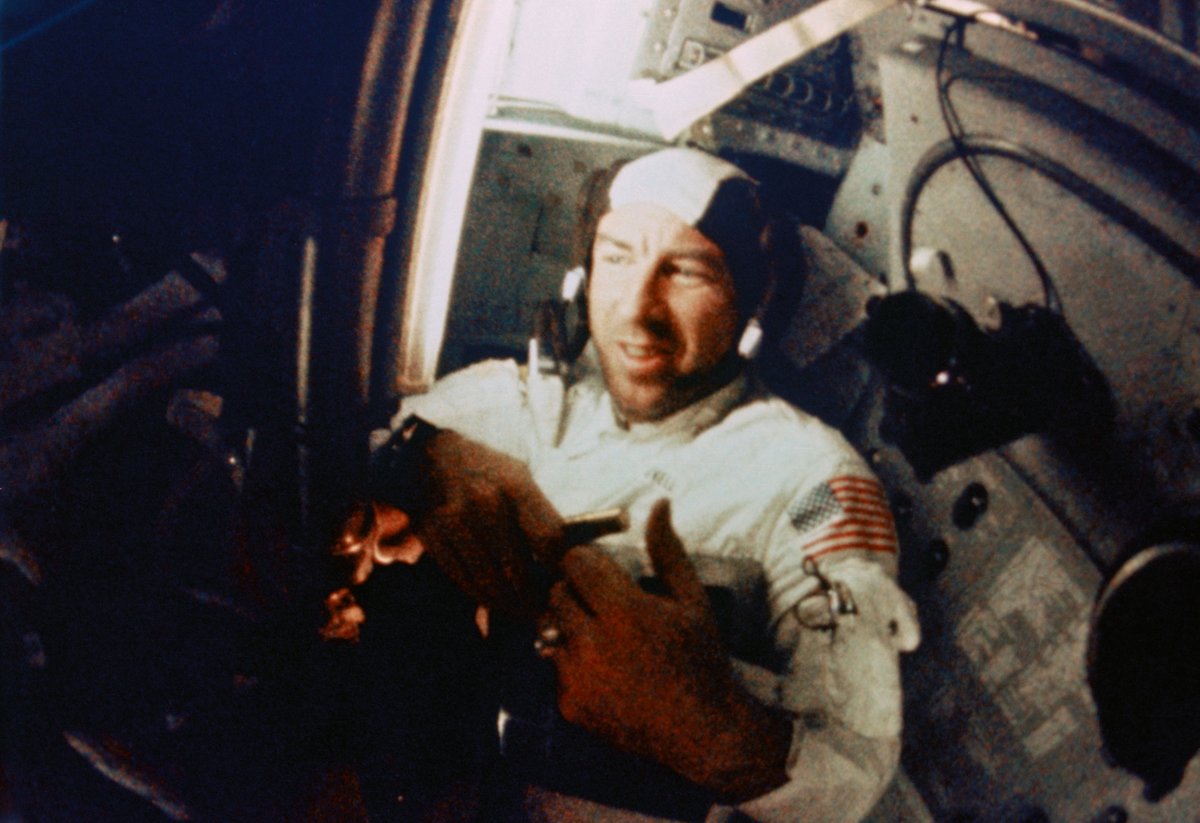 Astronaut James A. Lovell Jr., command module pilot, is shown during intravehicular activity (IVA) on the Apollo 8 lunar orbit mission. This still print was made from movie film taken by an onboard 16mm motion picture camera.