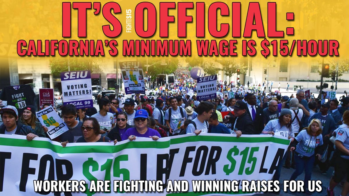 Picture from Fight for $15 and a Union strike April 15th, 2015 with the words "It's OFFICIAL: California's minimum wage is $15/hour - workers are fighting and winning raises for us"