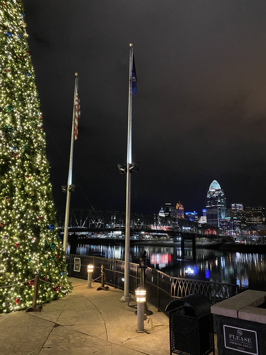 reillykiger's tweet photo. Thought this was a cool christmassy pic of Cincinnati but didn’t like the flag poles right in the middle. But my photoshop skills are so good no one would ever notice 😎 https://t.co/lnnl3HZUFg