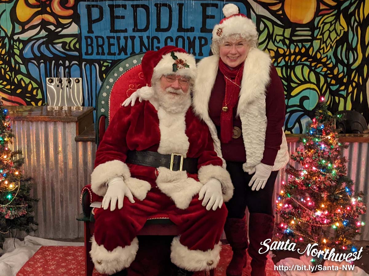 SantaNorthwest's tweet photo. Merry Christmas from Santa and Mrs. Claus. We hope everyone has a great Christmas and a Happy New Year. This is from our visit to @PeddlerBrewing  on Sunday. https://t.co/MUtRqbiYUL