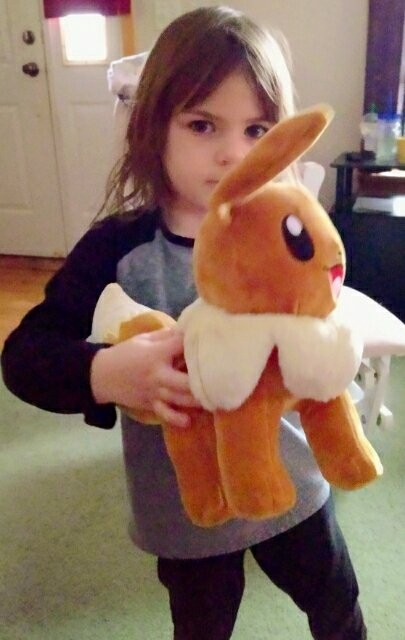 Cute_PurpleRose's tweet image. Merry Christmas eve! Anastasia loves her new Eevee plush! Eevee is her favorite Pokémon! #Pokémon #Eevee #EeveePlush