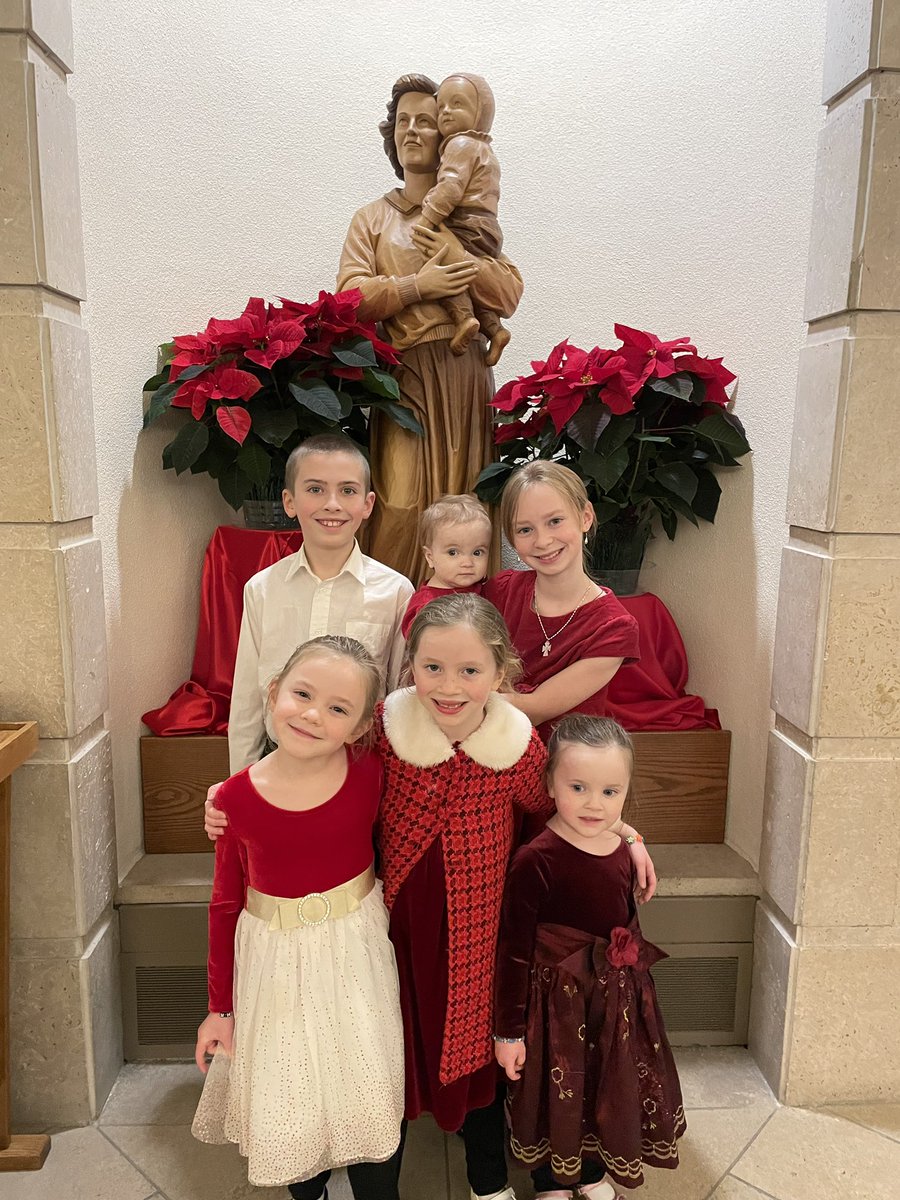 Kenny children pre-Midnight Mass at Saint Joseph’s in West St. Paul.