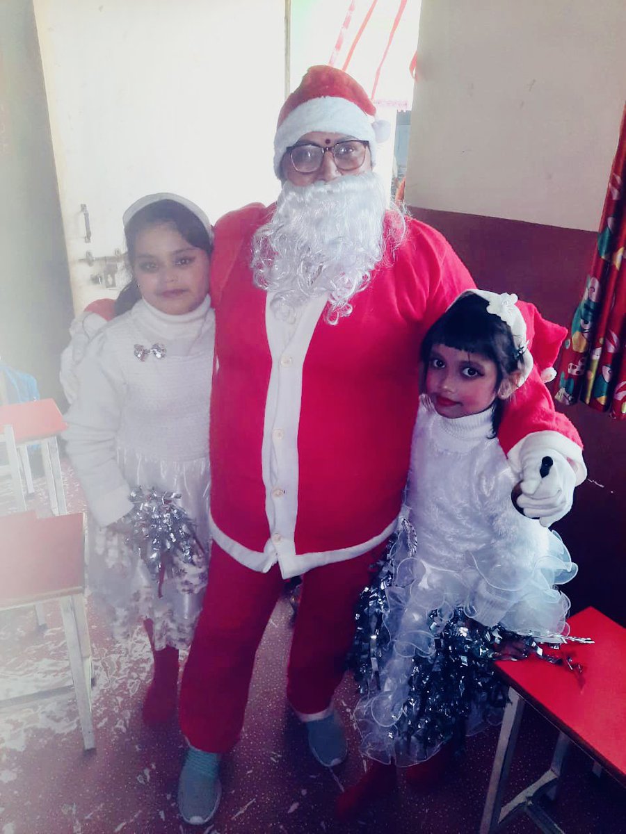 nehadixit123's tweet photo. My mother playing Santa again this year. And this time she forgot to remove her Bindi. So it is a female Santa with a bindi. 

India, we are like this only. The haters please go eat maalpua. 

Merry Christmas all!! https://t.co/I6HFTolOFv
