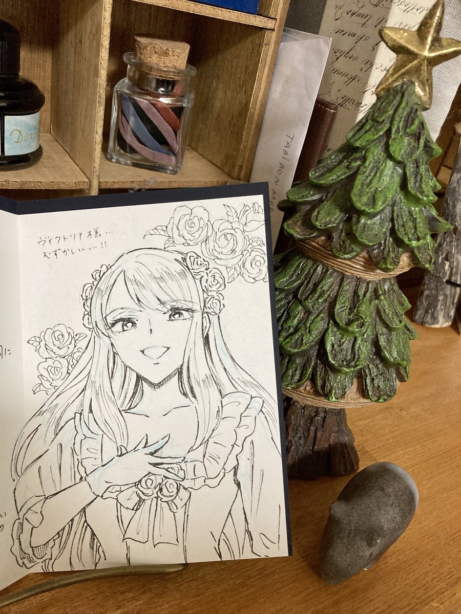ばたこ先生(@batako1_8 )がクリスマス+コミックス発売おめでとうってプレゼント送ってくれたよ嬉しい〜!ありがとう✨🥳🎉 ヴィクトリア描いてくれたの嬉しくて毎日眺めてにやにやしてます☺️🌹✨