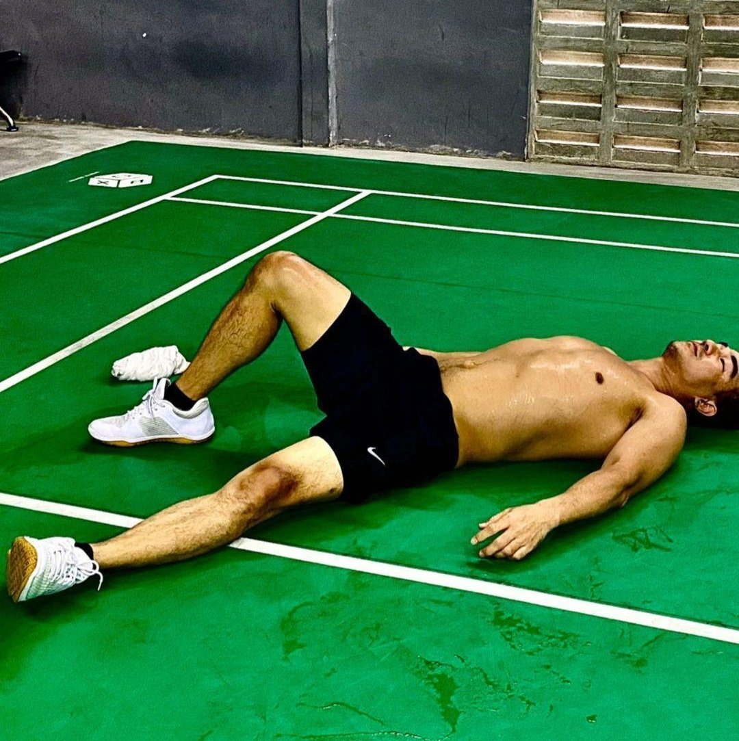 Joe Taslim shirtless and sweaty after badminton session. 